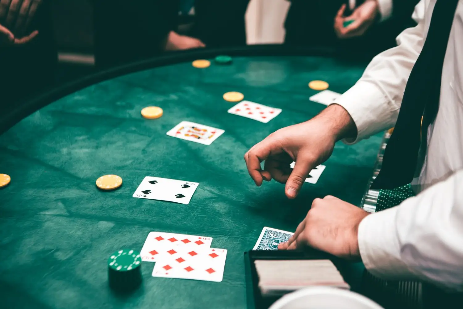Guests gathered around a poker table during an event