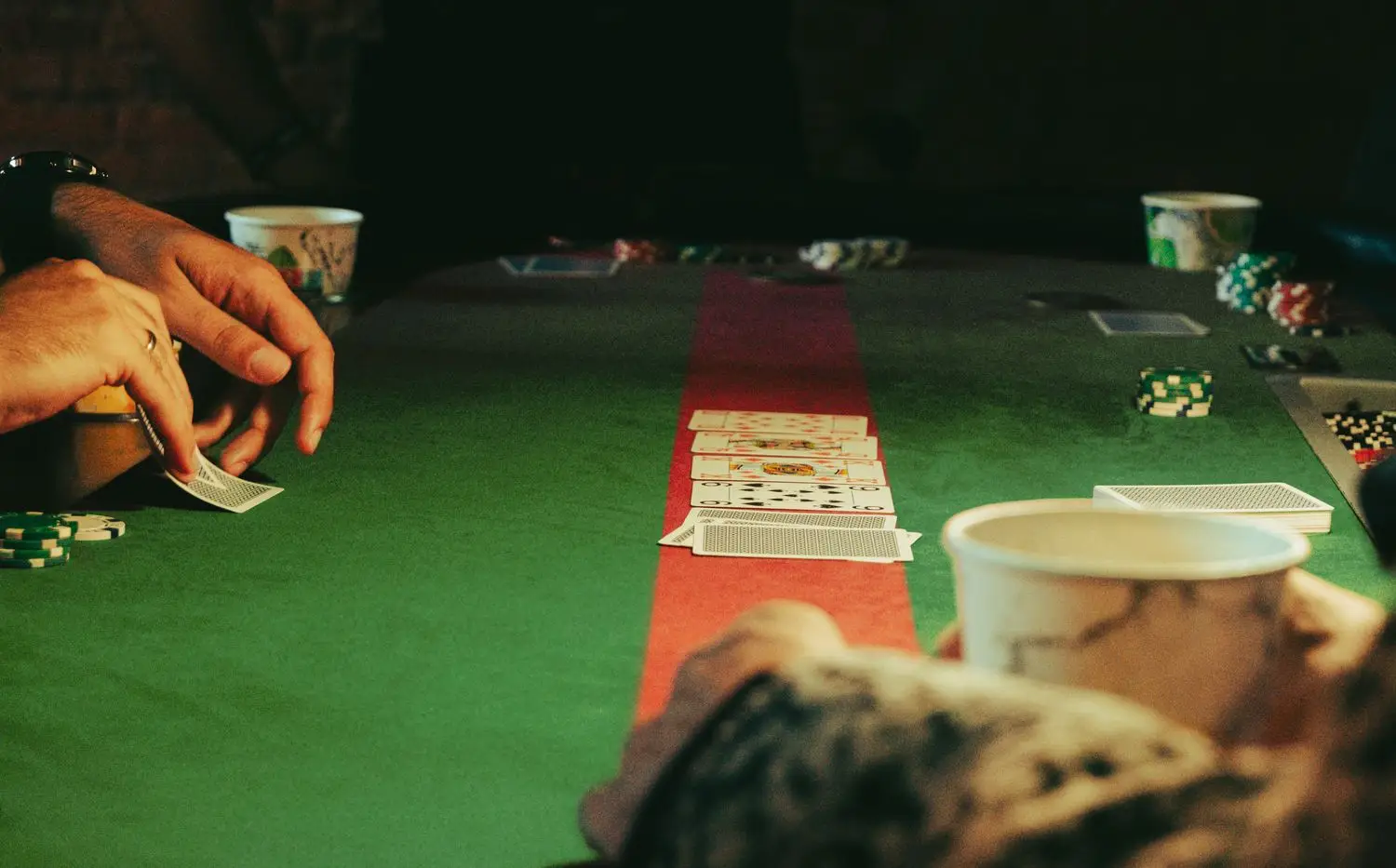 Guests participating in an event activity around a table