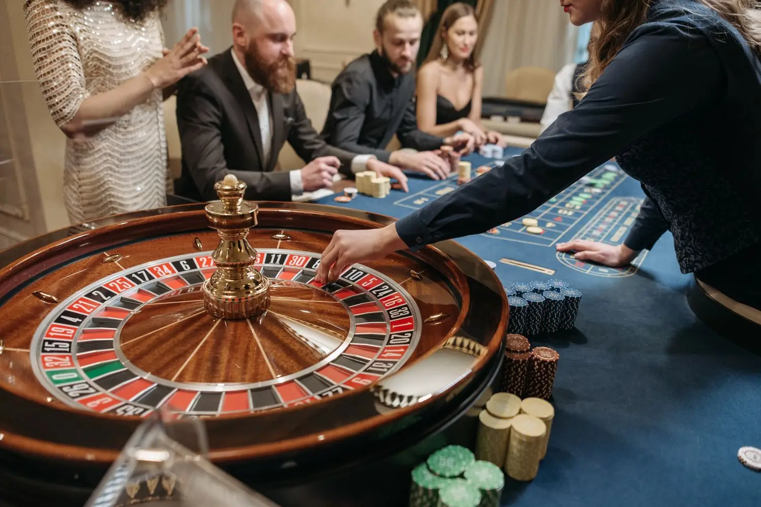 Table-based event game with guests gathered around the activity